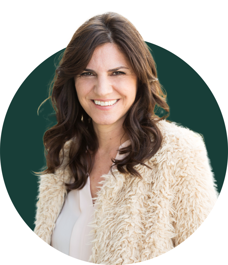 Woman smiling with restored teeth after multiple teeth replacement at Loudoun Family & Cosmetic Dentistry in Leesburg, VA